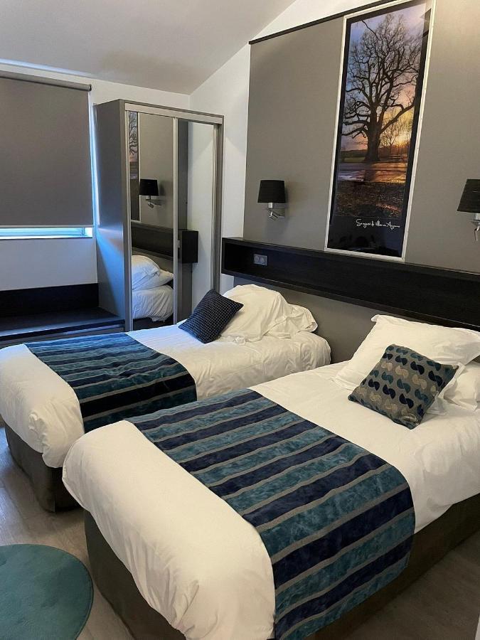 Logis Le Cheval Rouge Hotel Сант-Мену Екстериор снимка